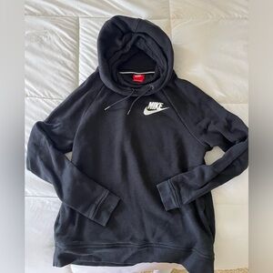 Nike sweatshirt with a hooded front.